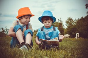 Boys reading a book